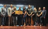 Left to right: Santa Rosa Rancheria Vice Chair Robert Jeff, Chairman Leo Sisco, Julia Patino, Beverly Rodriguez, Ulysses, JR, Lisa, Martha, and Kings County DA Keith Fagundes.